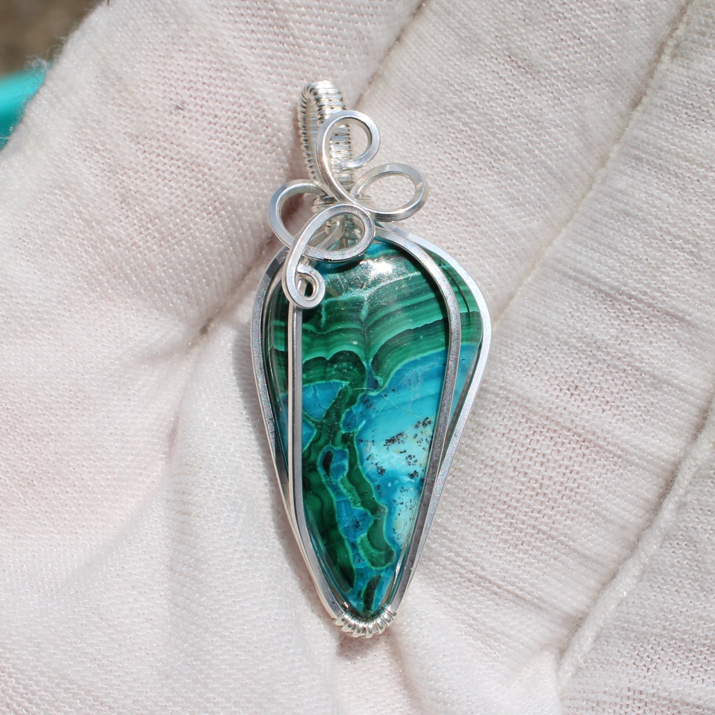 Sterling Silver Chrysocolla Malachite pendant with intricate silver wire wrapping by Different Branches LLC