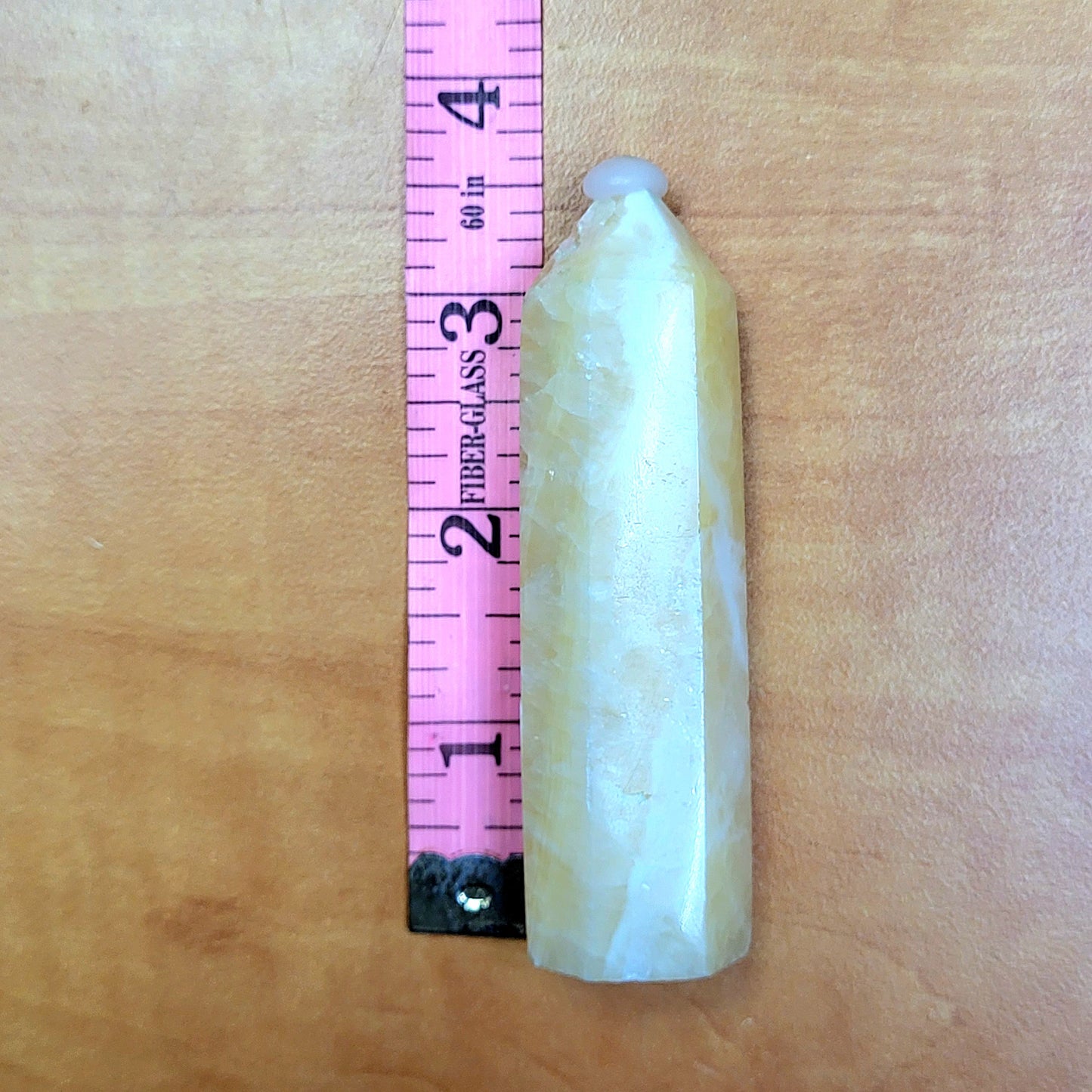 Yellow Calcite Towers Crystal with a Sleek Design for Healing and Decoration