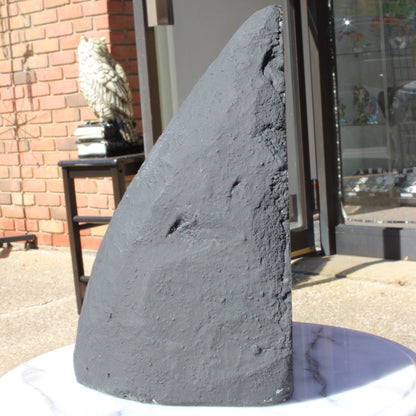 Unique black crystal sculpture with a sleek design, ideal for home decor featuring an Amethyst Cathedral