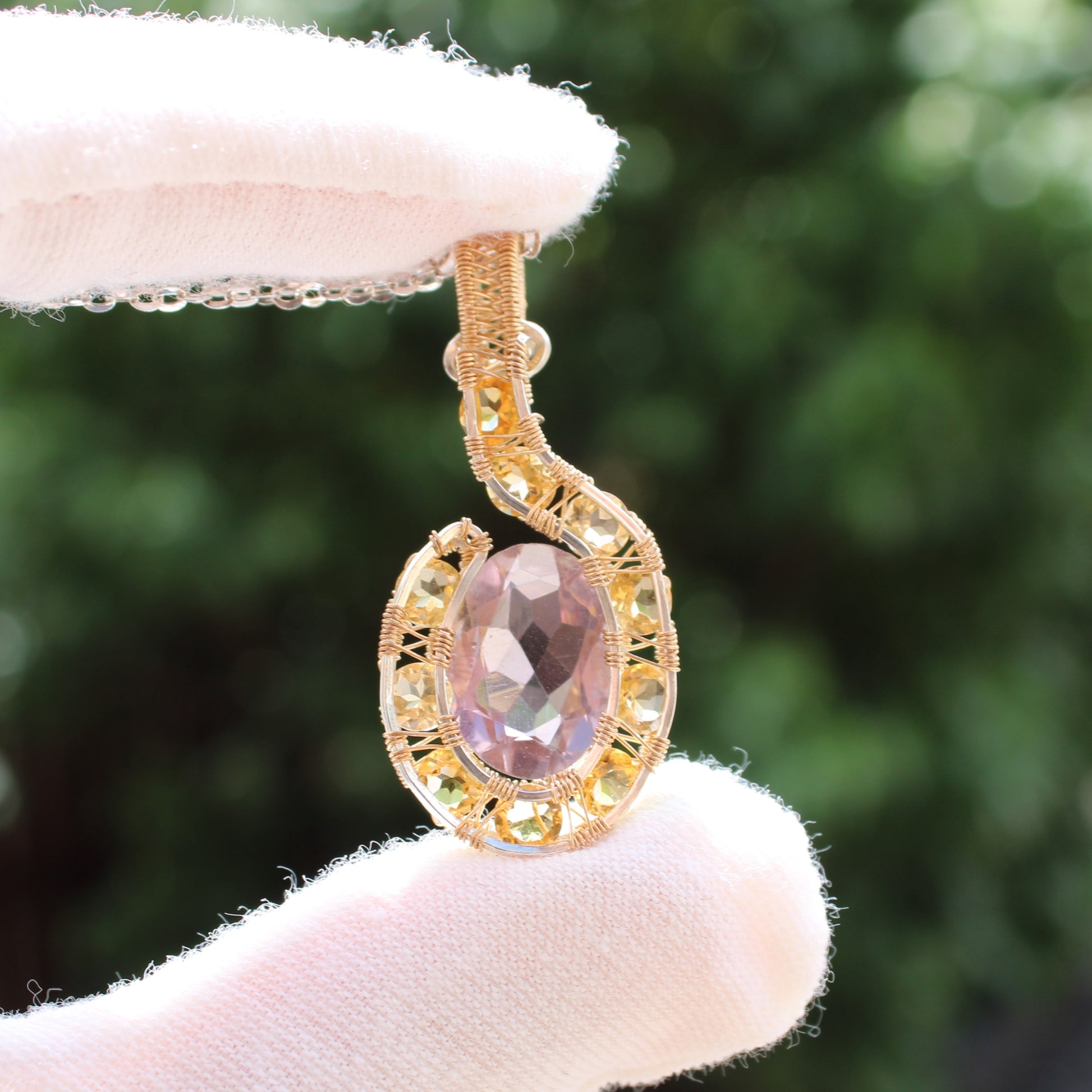 Elegant amethyst citrine pendant set in gold with intricate detailing, perfect for special occasions