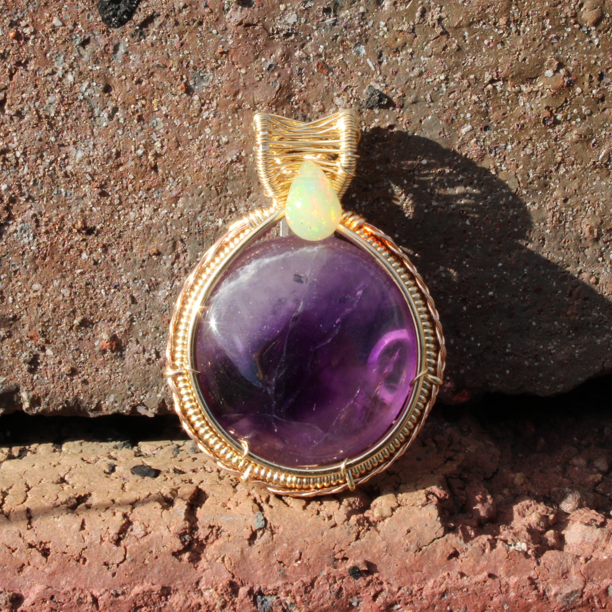 Amethyst Ethiopian Opal 14k yellow and rose gold fill pendant beautifully wrapped in gold wire