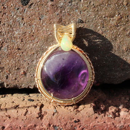 Amethyst Ethiopian Opal 14k yellow and rose gold fill pendant beautifully wrapped in gold wire