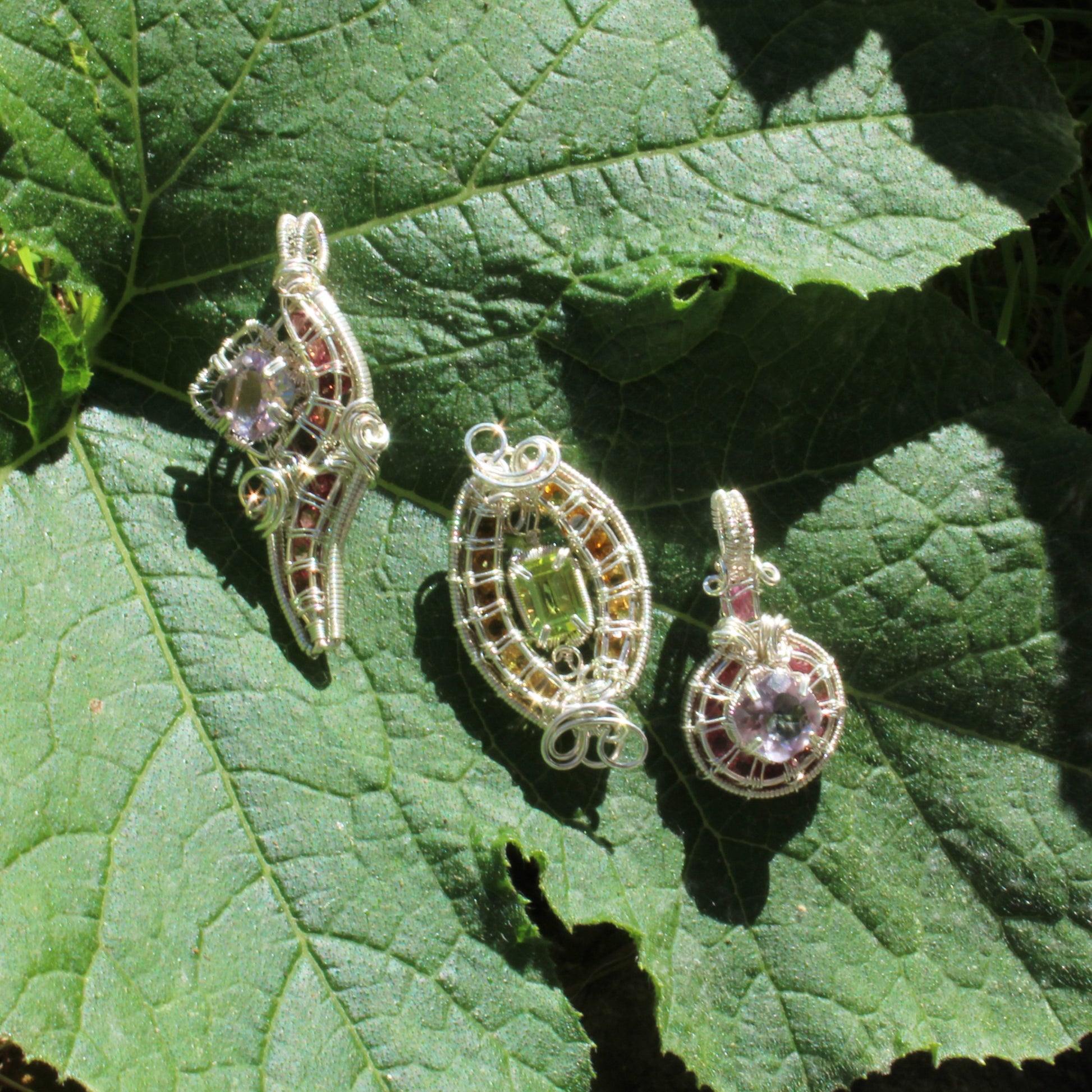 Handcrafted Jewelry Set featuring Amethyst Sterling Silver Pink Tourmaline Pendants on Green Leaves