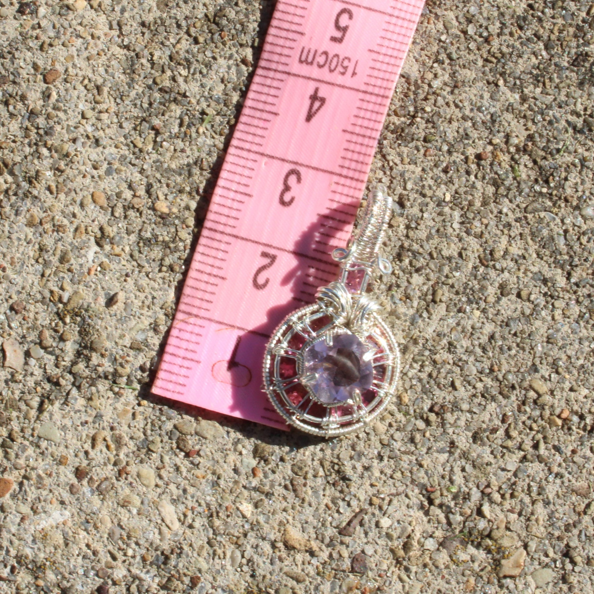 Amethyst Sterling Silver pendant featuring pink tourmaline stones and intricate wire design