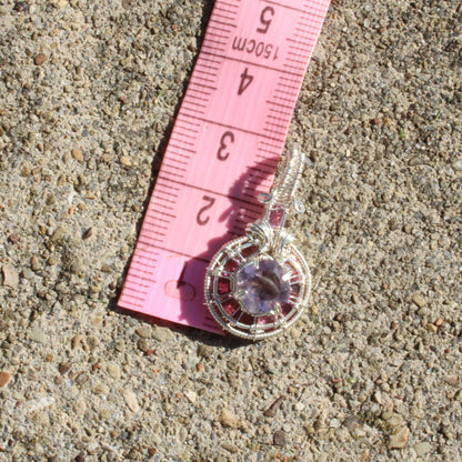Amethyst Sterling Silver pendant featuring pink tourmaline stones and intricate wire design