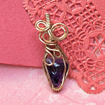 Handcrafted Amethyst Wire Wrapped Pendant with Unique Twisted Design