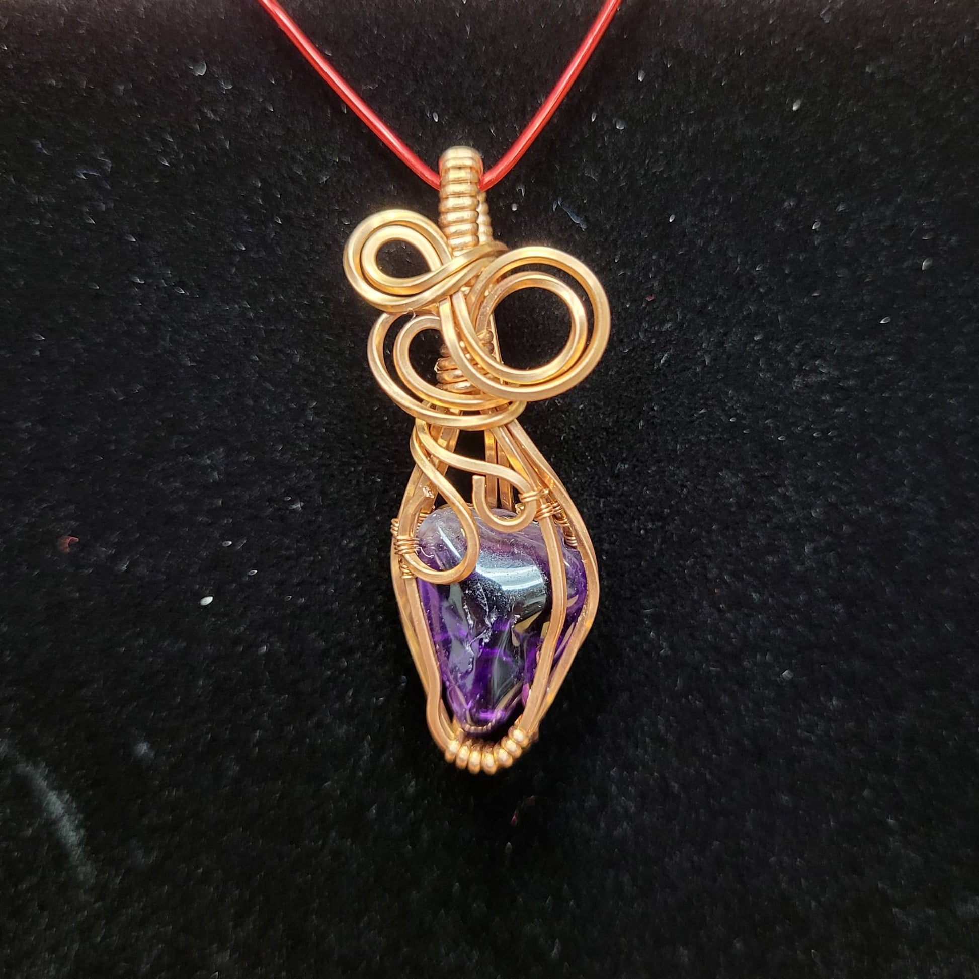 Handcrafted Amethyst Pendant Necklace with Unique Wire Wrap Design