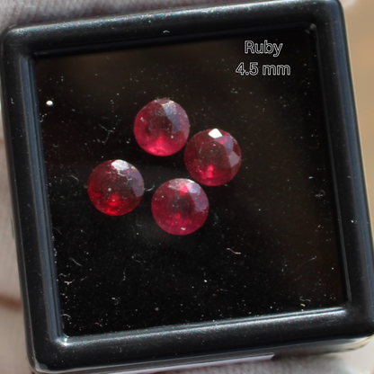 Four 4.5 mm faceted ruby crystals in a black display box for Made to order rings by Different Branches LLC