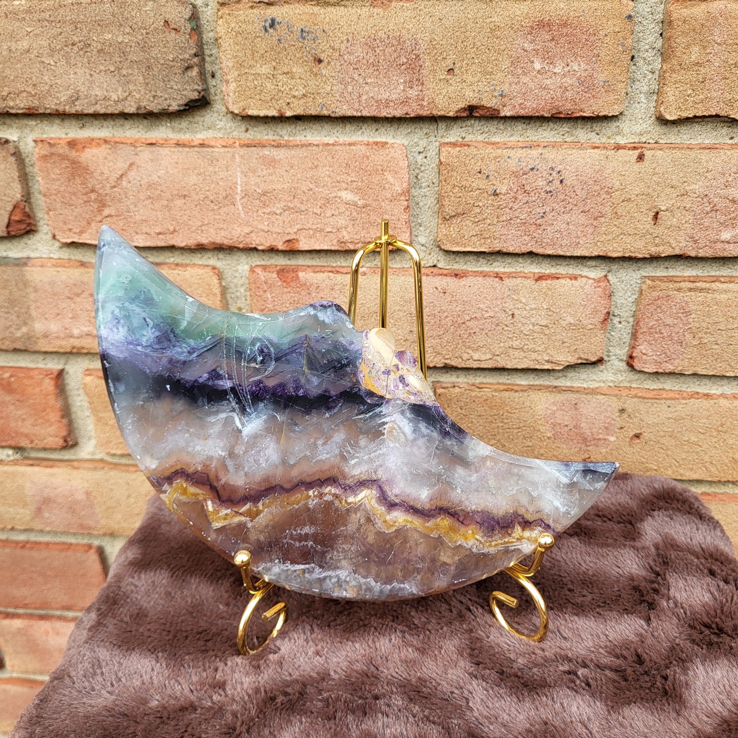 Big Rainbow Fluorite Moon Display Piece on a Gold Stand with Colorful Swirls
