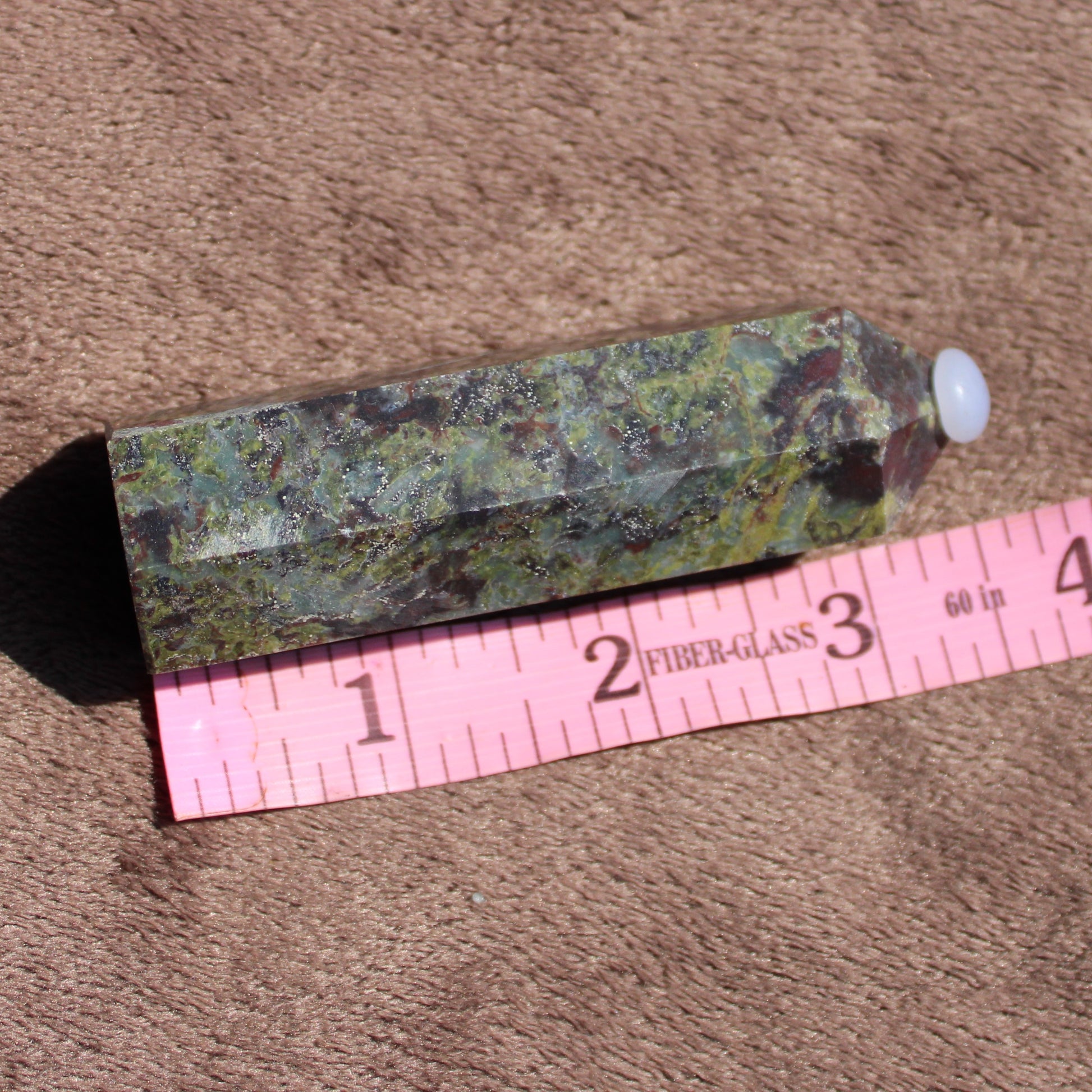 Unique bloodstone tower from Different Branches LLC with natural green and red patterns