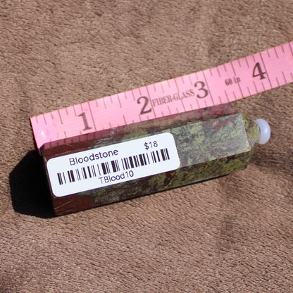 Bloodstone tower with unique green and red patterns, perfect for home decor or spiritual practices