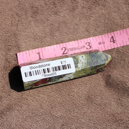 Natural Bloodstone tower with rich green and red hues, ideal for crystal enthusiasts