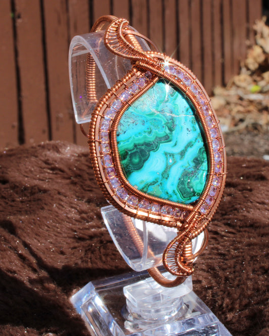 Chrysocolla malachite cz bracelet featuring intricate wire wrapping and vibrant green hues