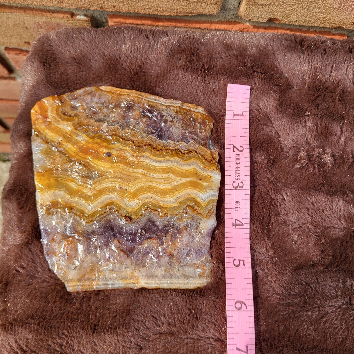 Unique Crazy lace amethyst slab with vibrant layers for home decor from Different Branches Crystal Gift Shop