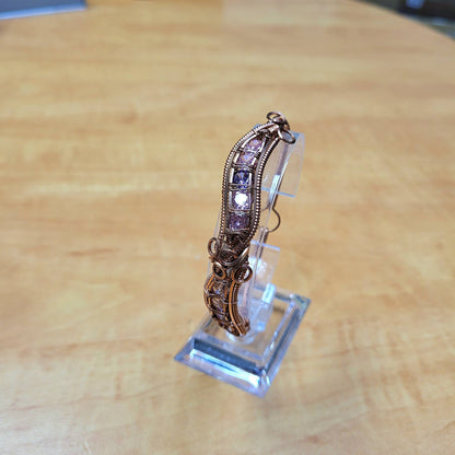 Elegant vintage cubic zirconia bracelet showcased on a display stand at Different Branches Crystal Gift Shop