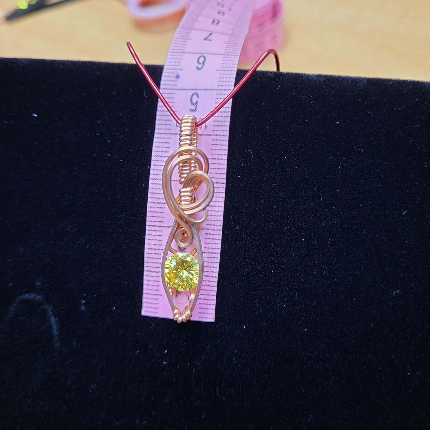 Handcrafted pendant featuring Cubic Zirconia Yellow gemstone on a stylish wire design