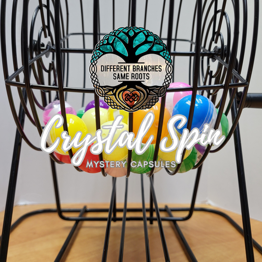 Colorful Crystal Capsule Spin Mystery Eggs in a Black Wire Basket by Different Branches LLC