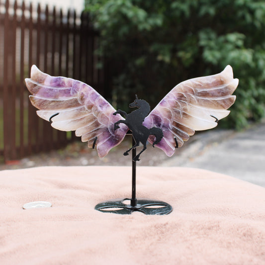 Dream Amethyst Unicorn Wings crystal decorative piece with purple and white translucent wings on metal stand