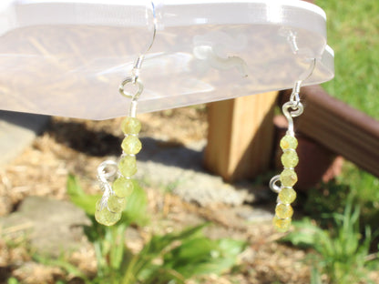 Handcrafted faceted bead earrings made of peridot, garnet, and lapis - Made to order