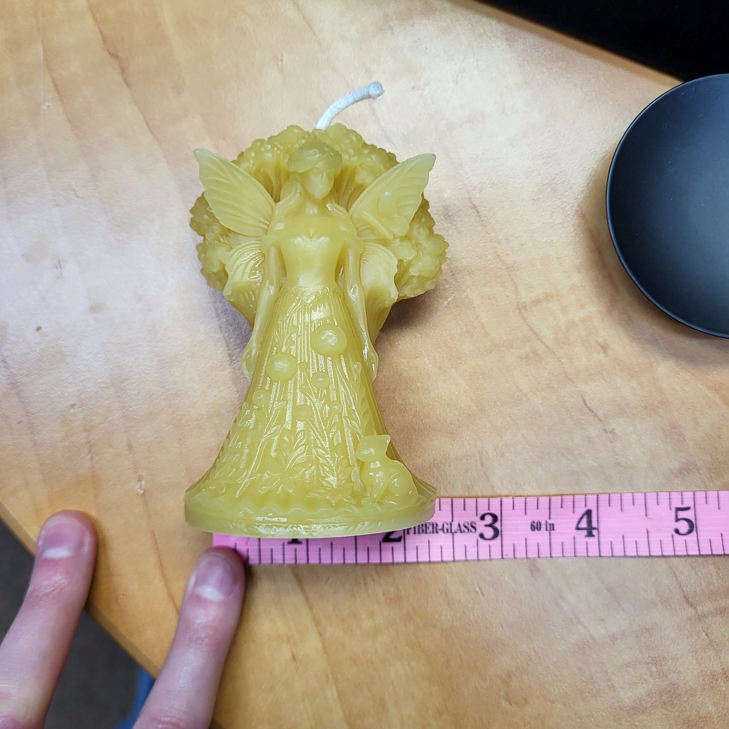 Forest Fairy beeswax candle shaped like a fairy with intricate design for decorative use
