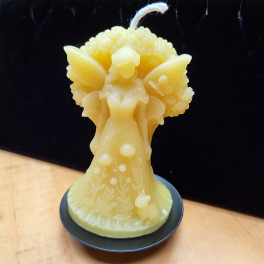 Unique Forest Fairy beeswax candle with intricate floral design and detailed fairy figure