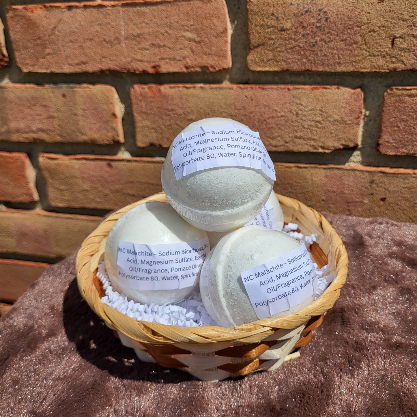 Made Natural Bath Bombs in a basket with Natural Color Cedarwood, Sweet Orange & Eucalyptus fragrance