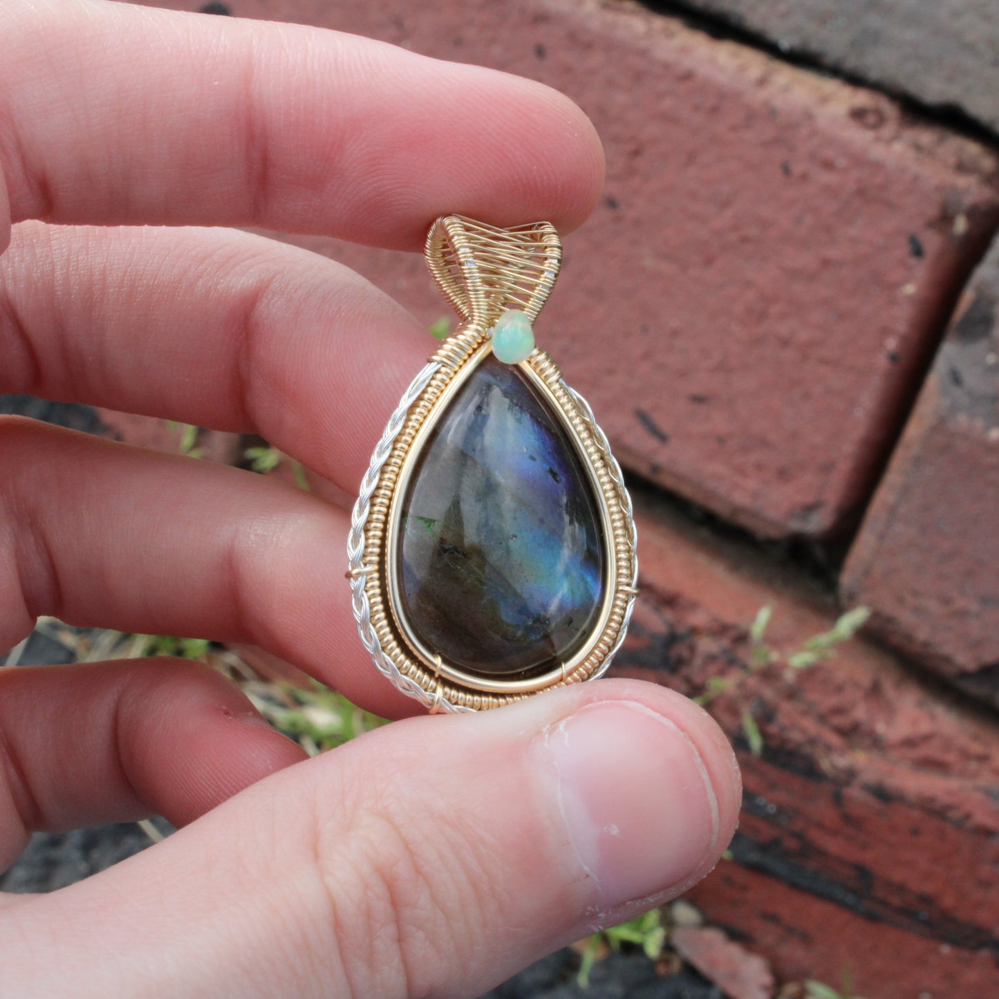 Labradorite 14k Gold Fill and Sterling Pendant showcasing a beautiful teardrop shape with intricate detailing