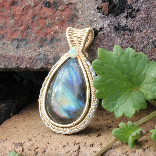Labradorite 14k Gold Fill and Sterling Pendant with a vibrant teardrop shape and intricate wire wrapping