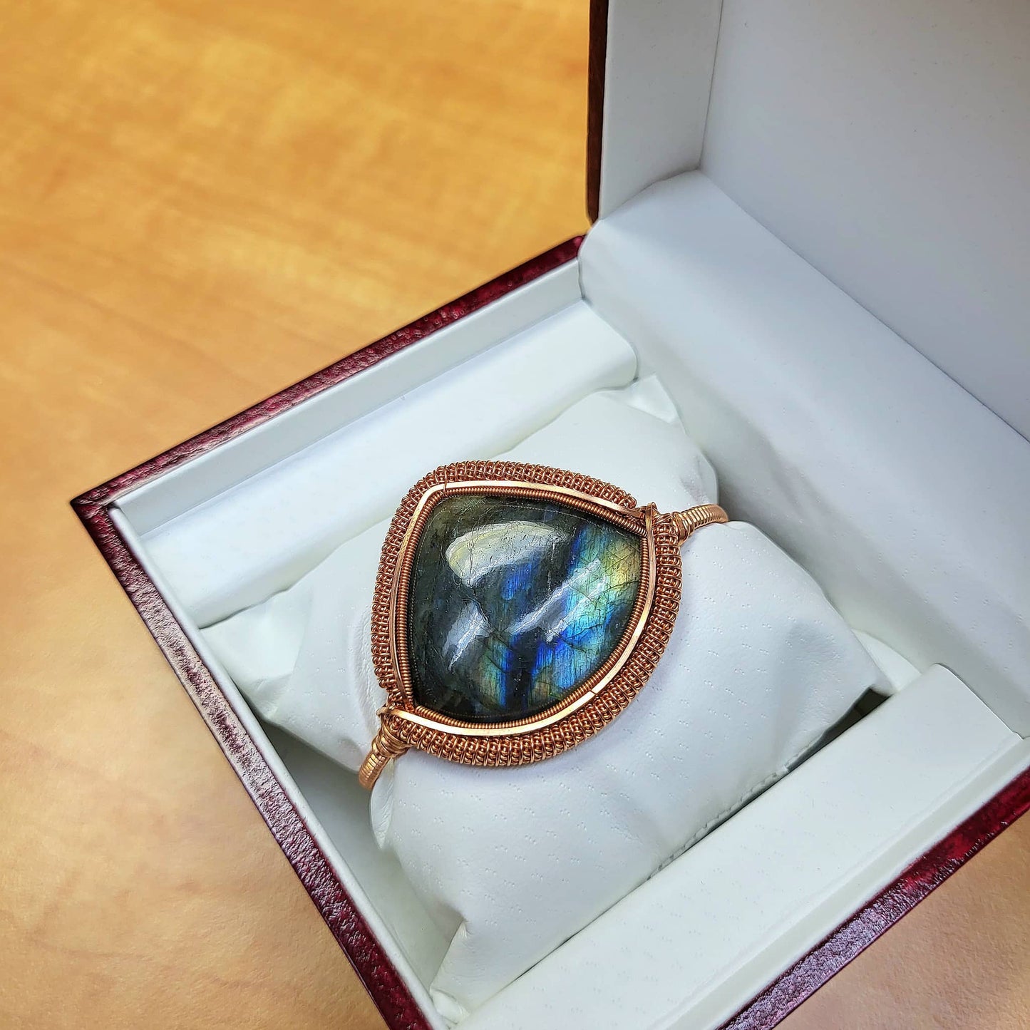 Labradorite big cabochon bracelet set in a copper frame, elegantly displayed in a gift box