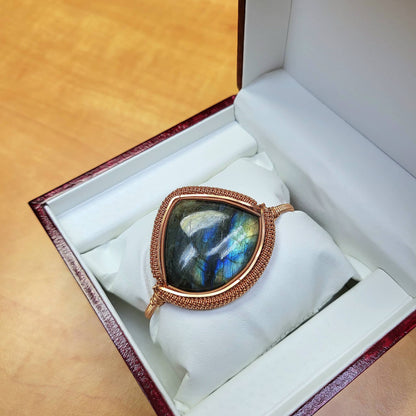Labradorite big cabochon bracelet set in a copper frame, elegantly displayed in a gift box