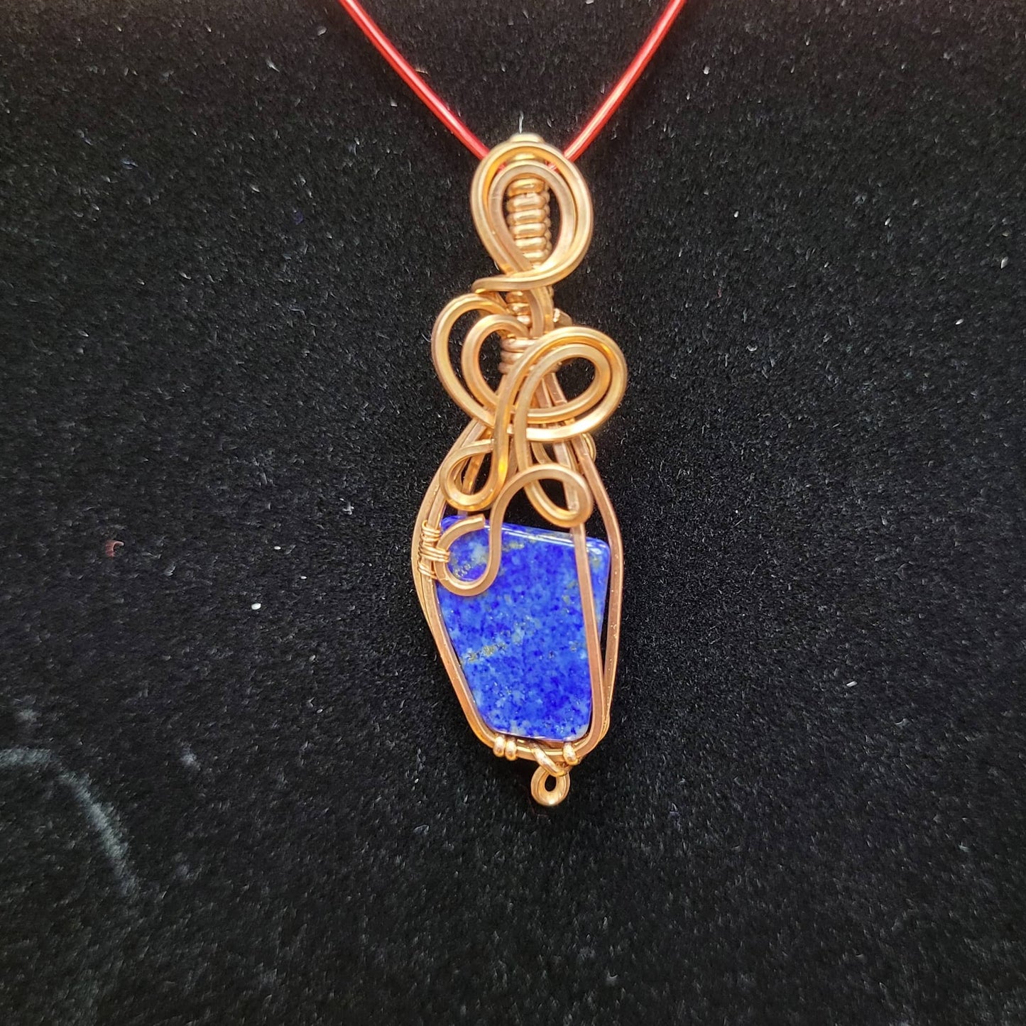 Handcrafted Lapis Lazuli Pendant Wrapped in Copper Wire Jewelry by Different Branches LLC