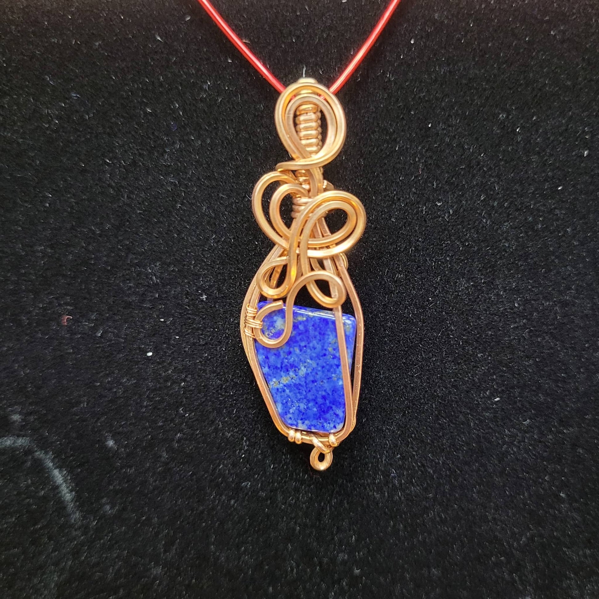 Handcrafted Lapis Lazuli Pendant Wrapped in Copper Wire Jewelry by Different Branches LLC