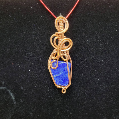 Handcrafted Lapis Lazuli Pendant Wrapped in Copper Wire Jewelry by Different Branches LLC
