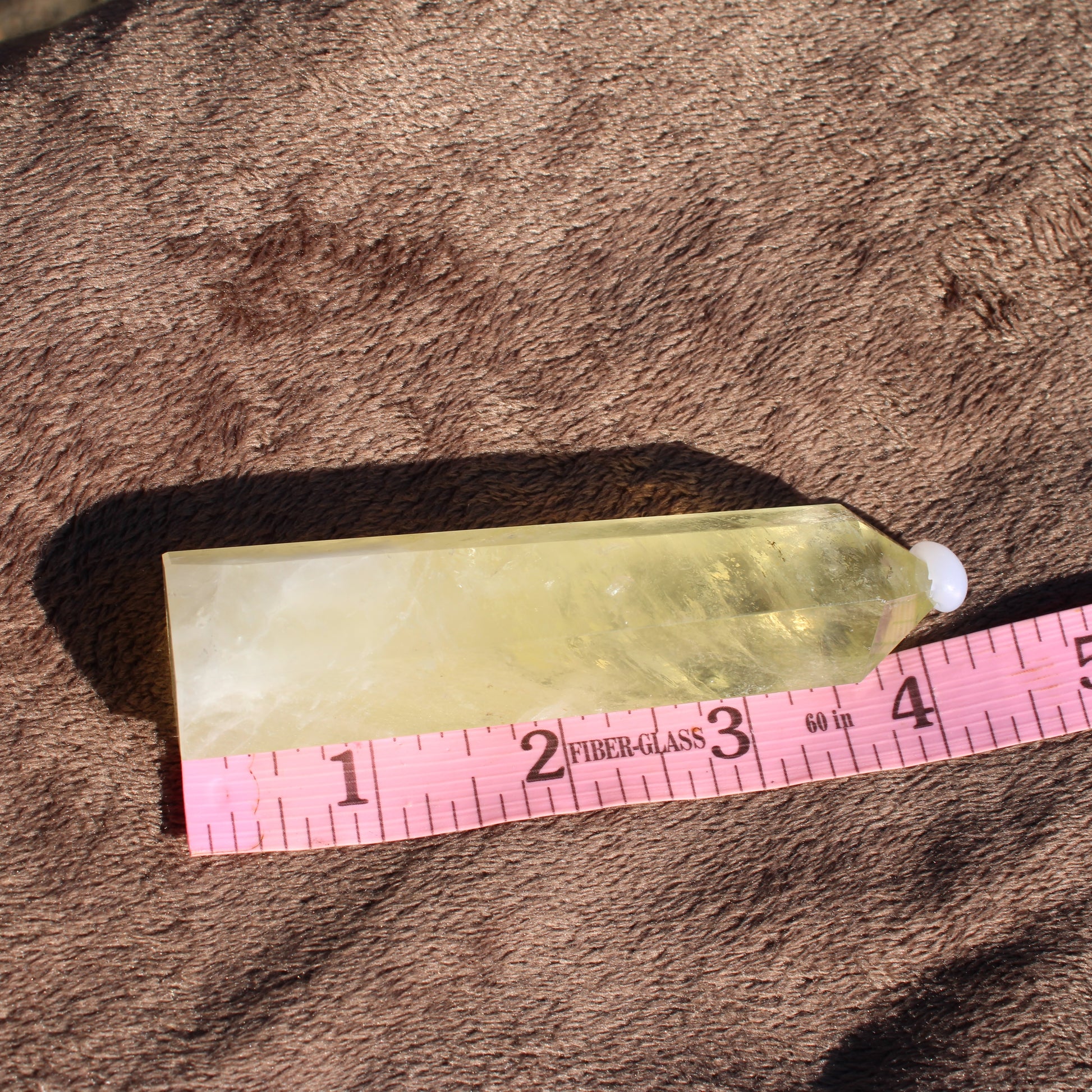 Lemon Quartz Tower with a vibrant yellow color, ideal for home decor and crystal healing