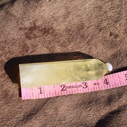 Lemon Quartz Tower with a vibrant yellow color, ideal for home decor and crystal healing