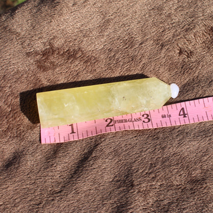 Lemon Quartz Tower with a smooth finish, showcasing its vibrant yellow color and natural crystal shape