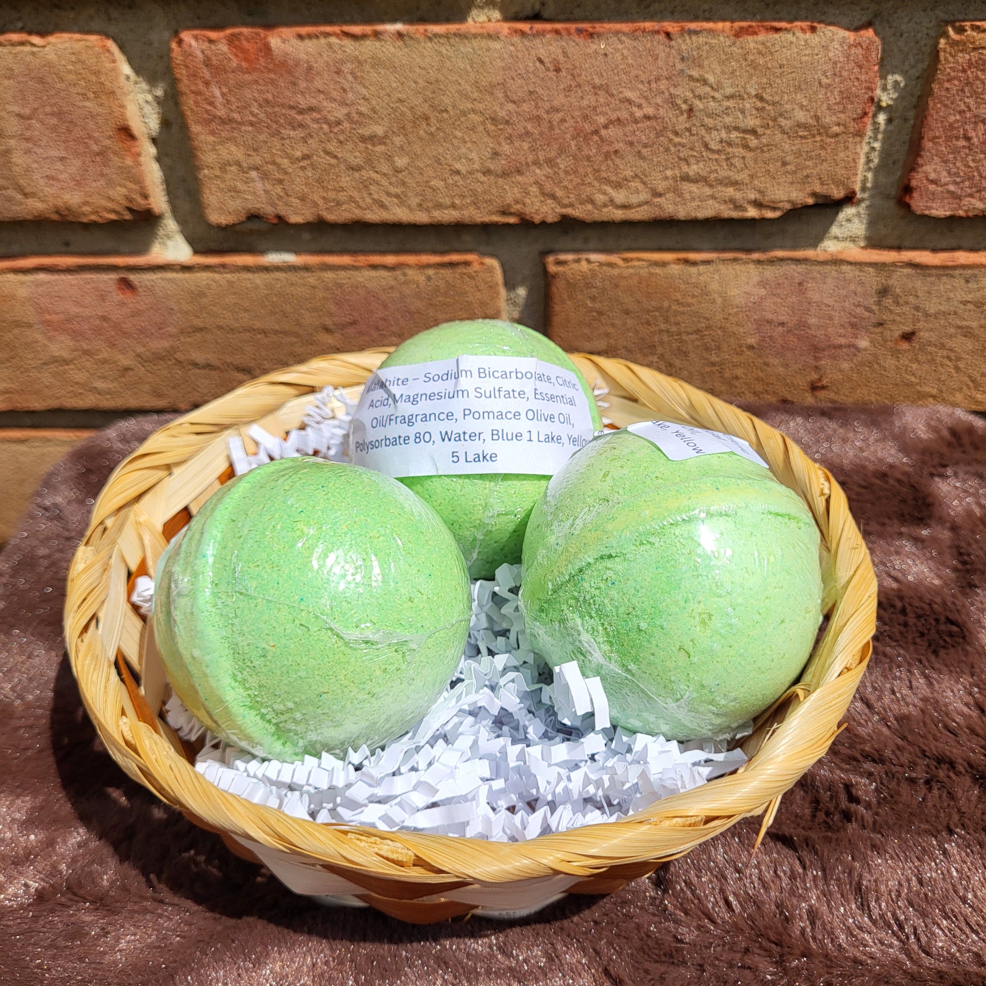 Made Natural Malachite Bath Bombs in a decorative basket, ready for a relaxing soak