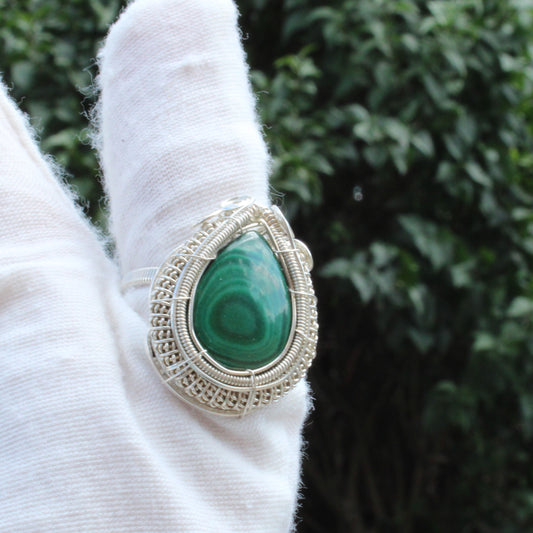 Elegant Malachite Sterling Silver Ring featuring a unique green stone and intricate detailing
