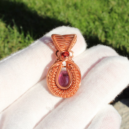 Mini amethyst copper pendant featuring intricate wire detailing and a vibrant stone, perfect for stylish jewelry lovers