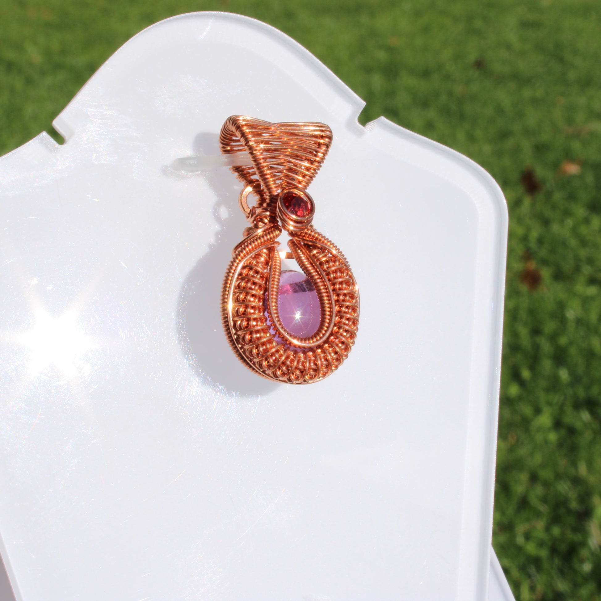 Mini amethyst copper pendant featuring intricate wire design and a stunning purple gemstone