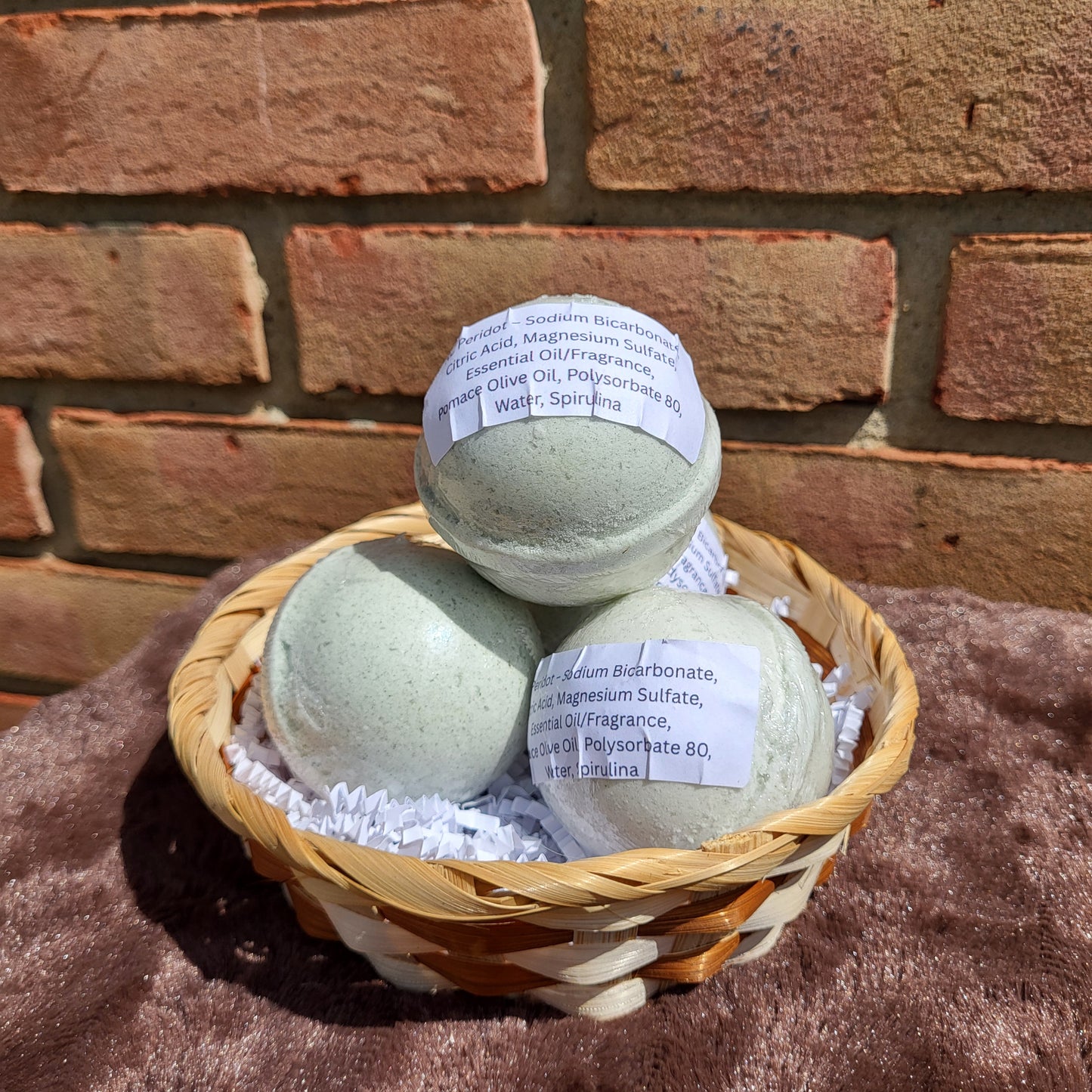 Made Natural Bath Bombs in a basket, featuring Natural Color Lemon, Sweet Orange & Spearmint scent