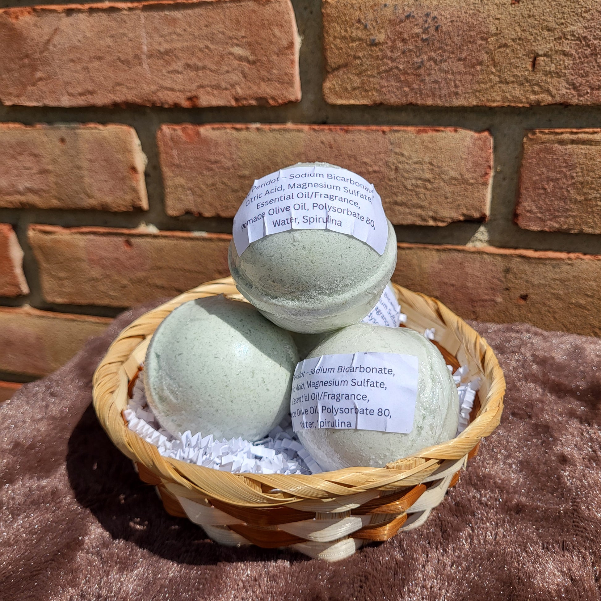 Made Natural Bath Bombs in a basket, featuring Natural Color Lemon, Sweet Orange & Spearmint scent