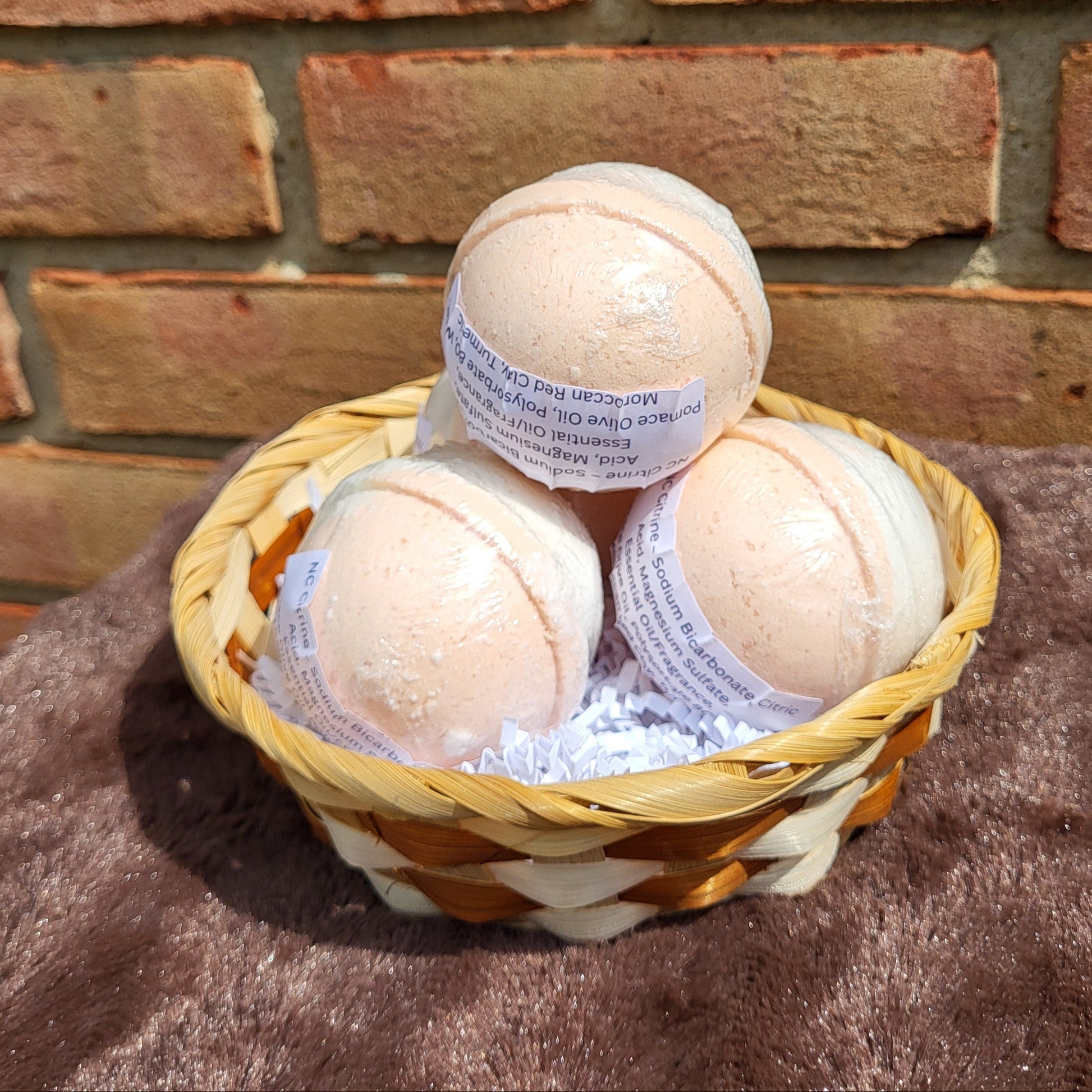 Made Natural bath bombs in a basket with Natural Color Sweet Orange, May Chang & Ginger fragrance