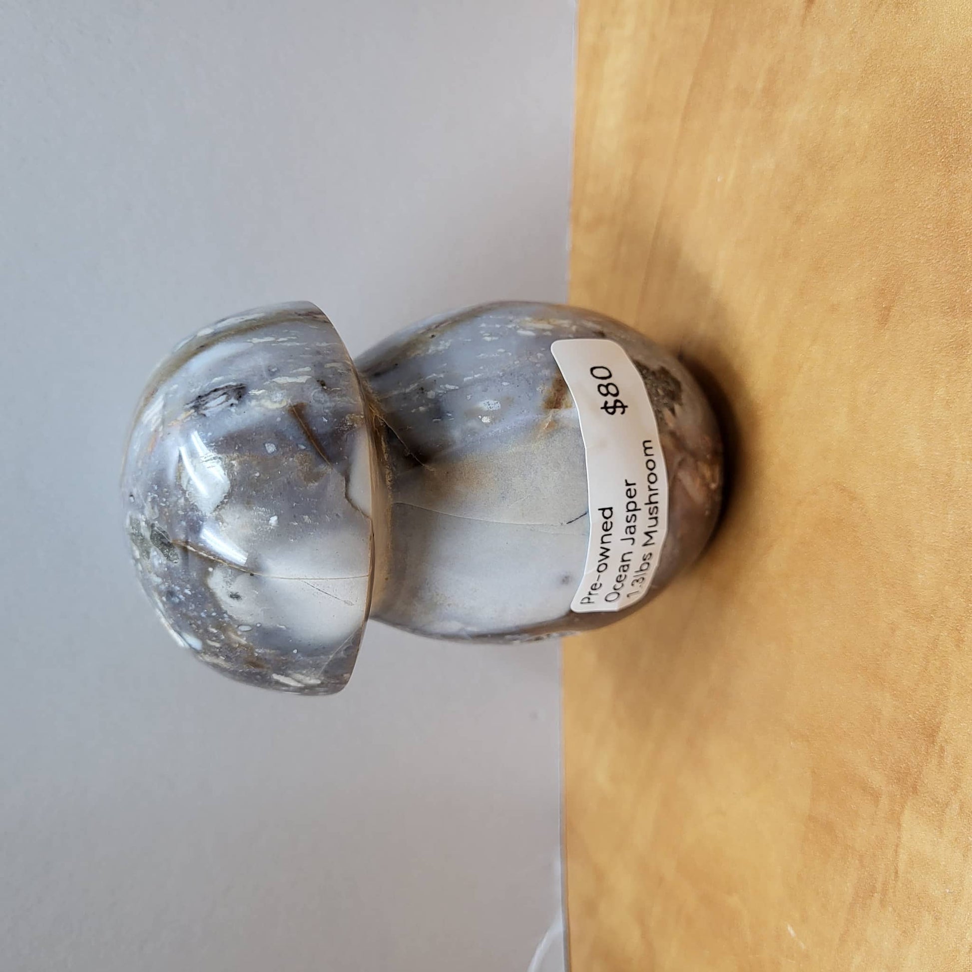 Pre-owned Ocean Jasper Mushroom sculpture in gray and white hues from Different Branches Crystal Gift Shop