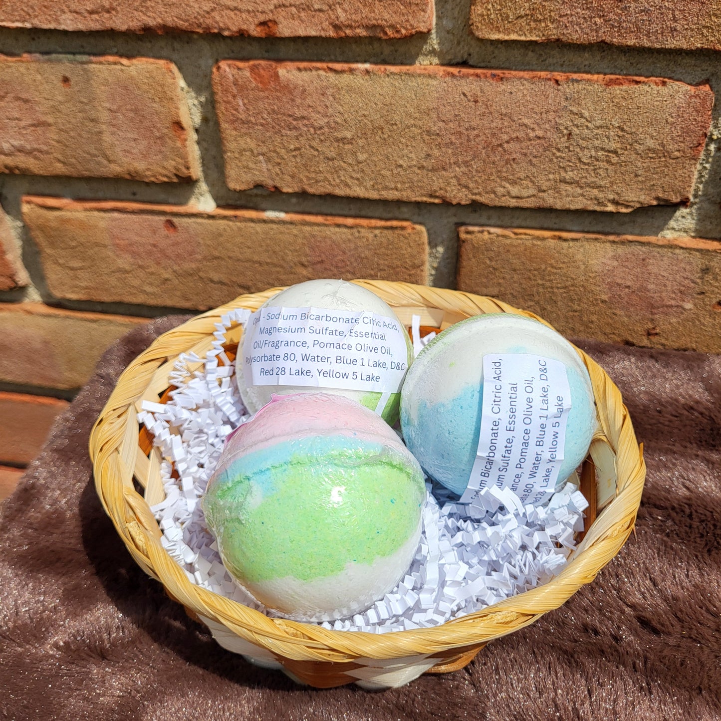 Made Natural Opal Bath Bombs in a wicker basket with colorful swirls for a relaxing bath experience