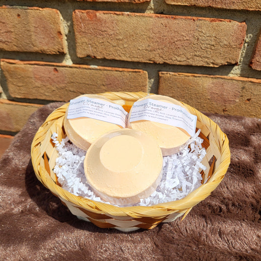 Made Natural Orange Shower Steamer in a decorative basket for a refreshing shower experience