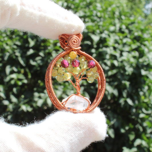 Handcrafted peridot apple tree - tree of life pendant with vibrant gemstones and copper wire detailing