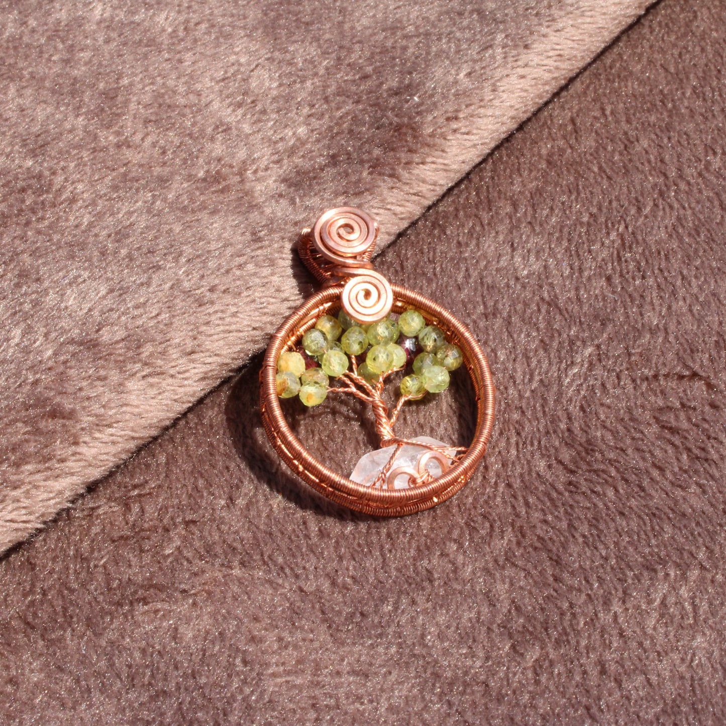 Handcrafted peridot apple tree - tree of life pendant with intricate copper detailing