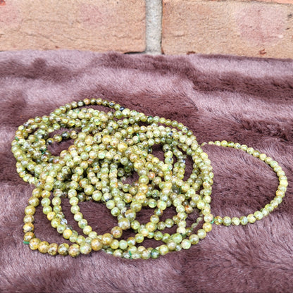 Beautiful Peridot bracelet with sparkling green beads, perfect for nature lovers and special occasions