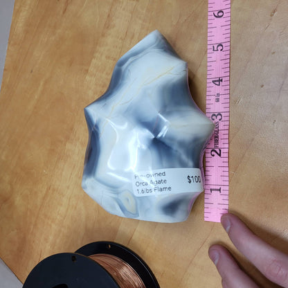 Orca Agate Flame sculpture with swirled patterns, perfect for home decor or gifts from Different Branches in Richfield, Ohio